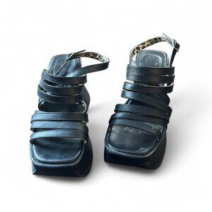 Demonia Pace-33 black vegan leather platform sandals Size 7 Some cracks in th